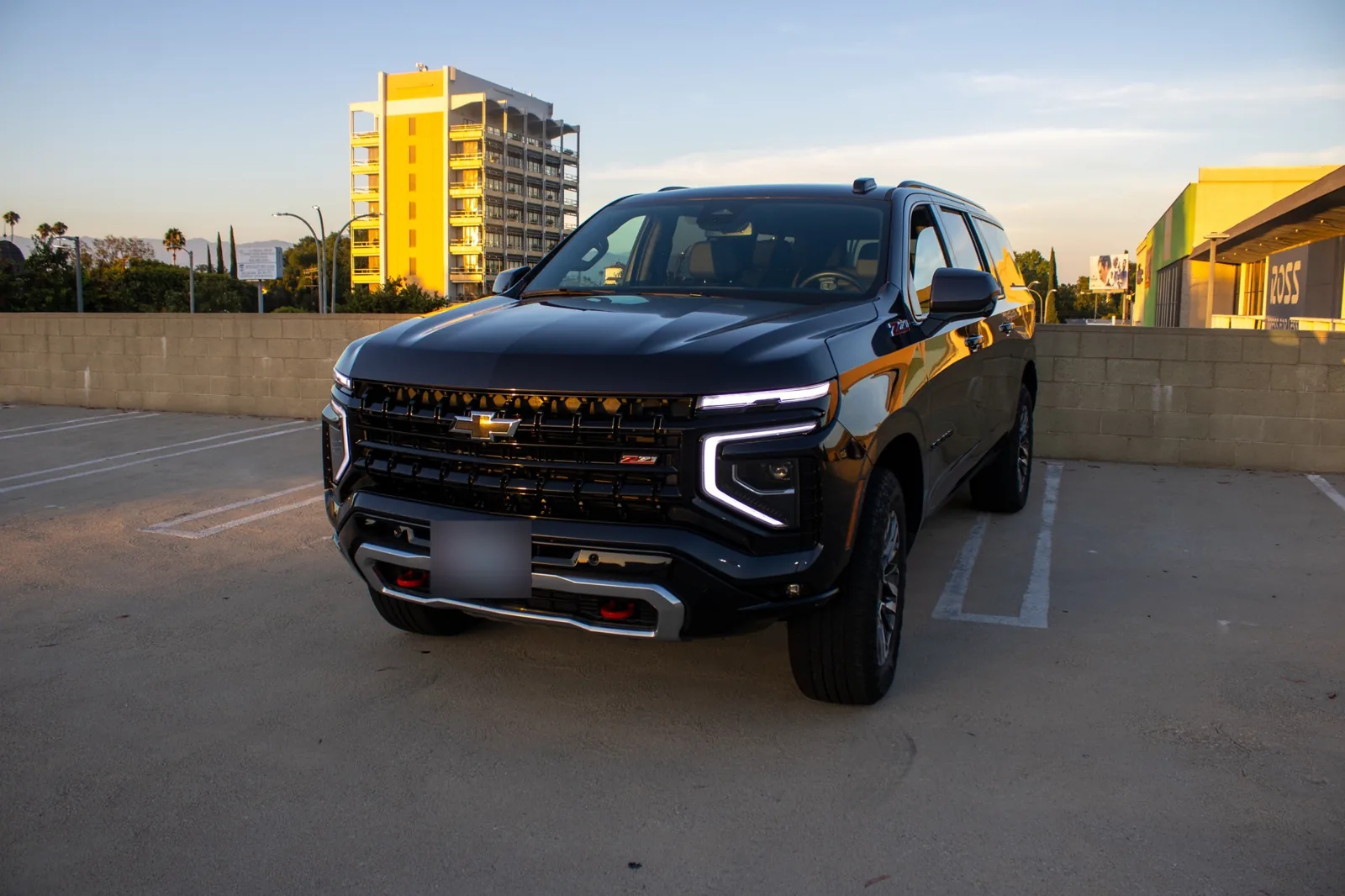 Black 2025 Chevrolet Suburban Z71 at sunset